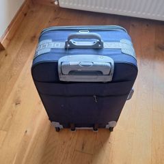 Luggage- Large second hand planne luggage- suitcase.