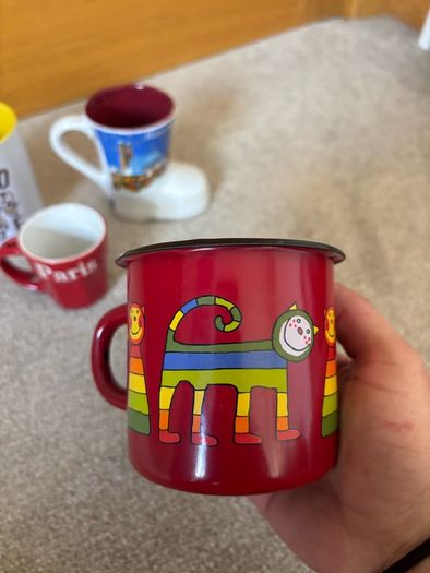 A collection 4 random Cups/ mugs