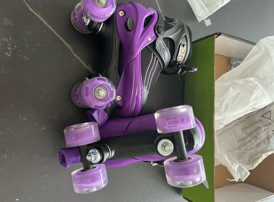Never been used before still in the box Big kids size medium roller skates