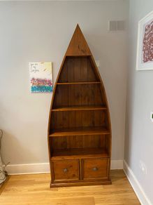 Solid wooden bookcase boat shaped