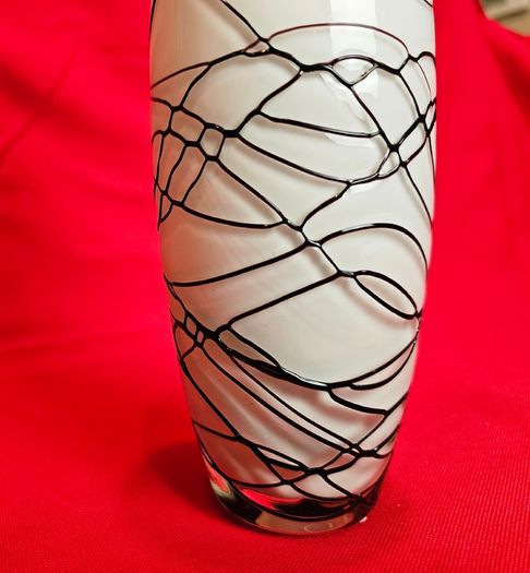 A decorative glass vase made of blown art glass, resembling a bottle in Murano style. Ornament
