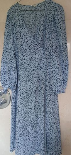 full length monkl blue summer dress with long sleeves.
