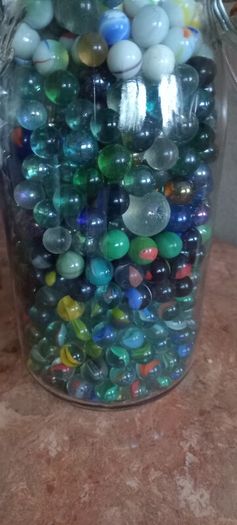 Antique collection of old marbles in large clip sealed jar it's full to the top loft find from very old house in France Beautiful