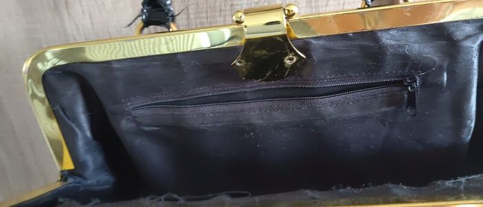 Black lacquered gold bag