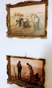 Pair of vintage reproductions behind glass