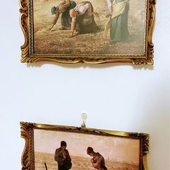 Pair of vintage reproductions behind glass