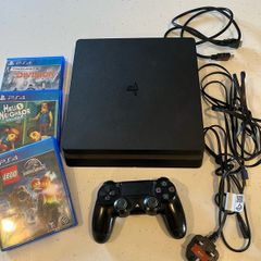 PS4 Slim 1 TB storage version with games and controller