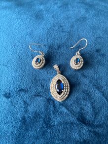 Silver, sapphire and cubic zirconia earrings and pendant set
