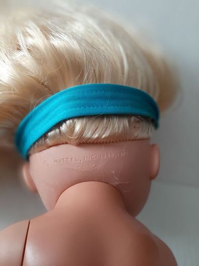 collectable vintage matel doll in original clothes