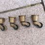 Cupboard door knobs/handles + antique brass castors + brass doorknobs Image 4
