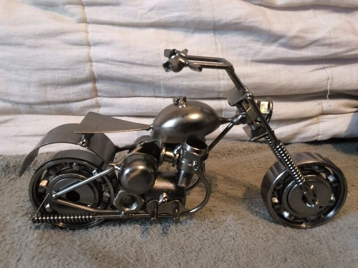 White metal made motor bike