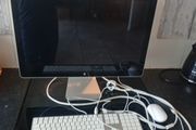 Apple computer working has a tiny black dot on the screen