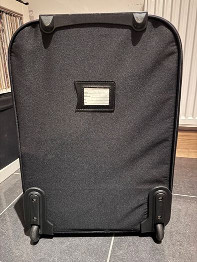 Black suitcase with brown trim