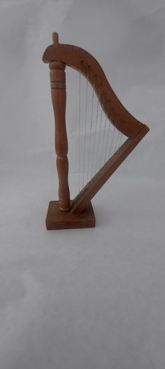 handcrafted wooden display harp ,,lovely display item for any man cave pub restaurant etc etc etc, buyer collects or pays postage.