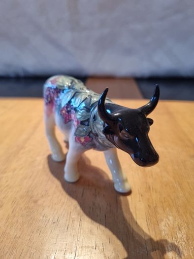 Porcelain colorful cow figurine