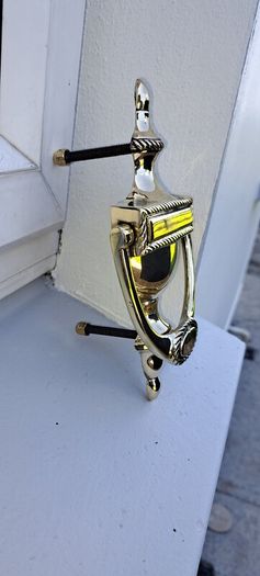 old brass door knocker