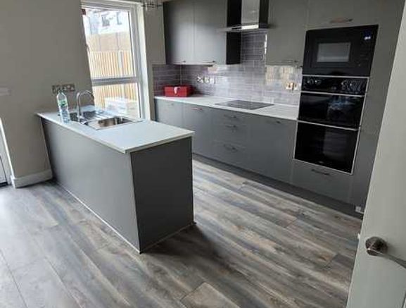 Laminate floor fitting