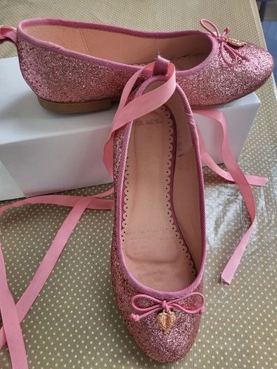 Angel's face pink glitter ballerina shoe