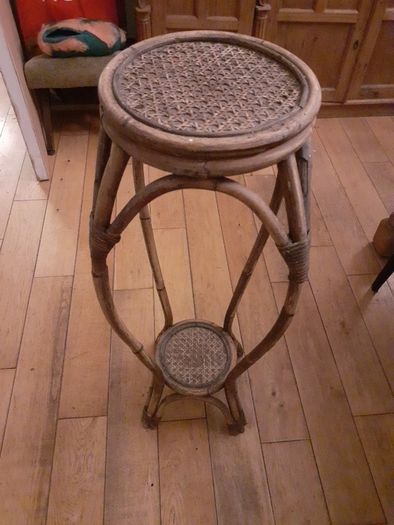 Rattan plant stand.