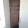 Timer and white wardrobe and bedside locker Image 4