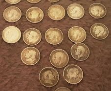 selection of silver threepence coins