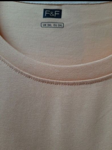 New tee shirts tag attached