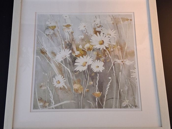 Set of floral pictures in frames