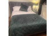 Reduced kingsize bed frame with matching curtains and leather armchair