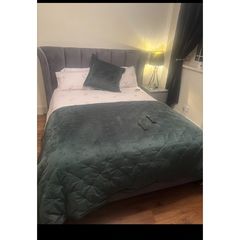 Reduced kingsize bed frame with matching curtains and leather armchair