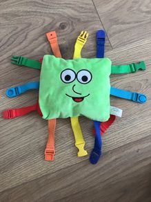 Soft buckle toy