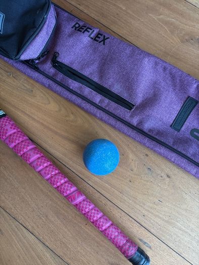 hockey stick and bag