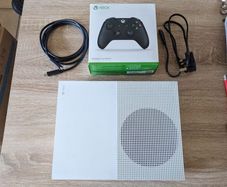 Xbox One S console 1TB with controller and cables.