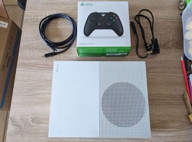 Xbox One S 1TB with controller and cables.