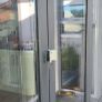 Large white bifold pvc door ,grey wrap on outside Image 2