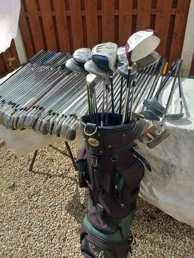A selection of Golf clubs. Bags and golf balls.
