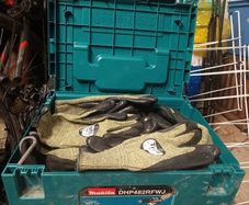 Box of protective gloves grade D