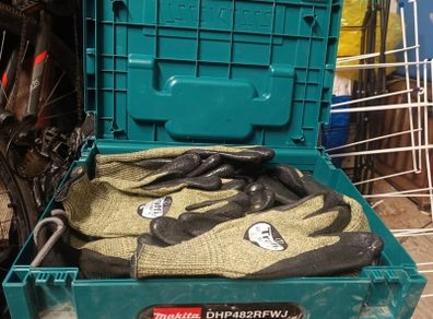 Box of protective gloves grade D
