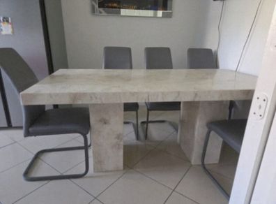 solid marble dining and 6 chairs.