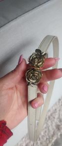 Rose belt never worn Price 18 euro