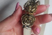Rose belt never worn Price 18 euro