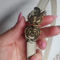 Rose belt never worn Price 18 euro