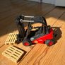 Bruder Linde H30D Forklift with Trailer Coupling and 2 Pallets scale 1:16 Image 2