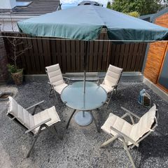 Garden Table with 4 recliner arm chairs with cushions & parasol