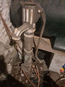 Antique cast iron water pump