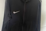Nike zip up top size 8-10 years old