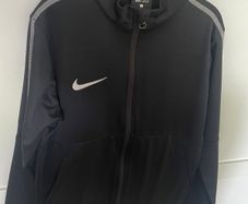 Nike zip up top size 8-10 years old