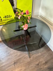 Round black glass table