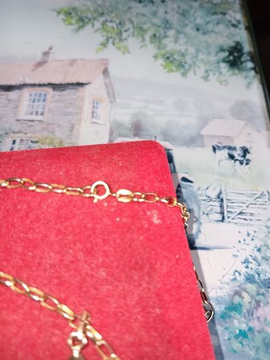 9ct gold cross pendant on 18 inch chain