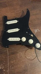 Strat pickguard wired with Fender Noiseless and premium components