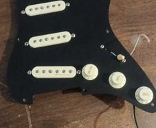 Strat pickguard wired with Fender Noiseless and premium components